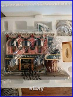 Eagles Hawthorne ho train set and Christmas village, brand new, never used