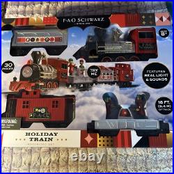 FAO Schwarz Holiday Train Motorized Train Set 30 Pieces With Light Sound