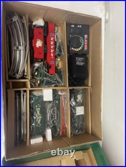 Lionel 6-21944 O27 Gauge Christmas Train Set withmusical boxcar