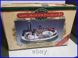 Mr Christmas GOING HOME FOR THE HOLIDAYS animated train with 50 songs NIB