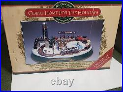 Mr Christmas GOING HOME FOR THE HOLIDAYS animated train with 50 songs NIB