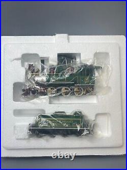 NIP Thomas Kinkade's Christmas Express Train Set with 6 Cars and 26 Tracks READ