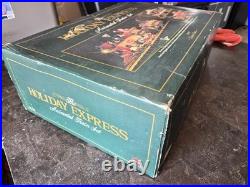 The HOLIDAY EXPRESS Animated Christmas Train Set #380 1997 LE The HOLIDAY EXPRESS Animated Christmas Train Set #380 1997 LE
