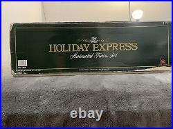 The HOLIDAY EXPRESS Animated Christmas Train Set #380 New Bright 1996s