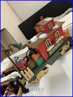 The HOLIDAY EXPRESS Animated Christmas Train Set #380 New Bright 1996s