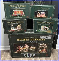 The HOLIDAY EXPRESS Animated Christmas Train Set #380 with380-1,384-2,384-5,384-10
