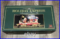 The HOLIDAY EXPRESS Animated Christmas Train Set #380 with380-1,384-2,384-5,384-10