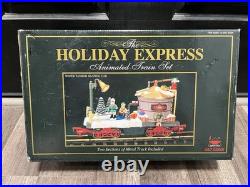 The HOLIDAY EXPRESS Animated Christmas Train Set #380 with380-1,384-2,384-5,384-10