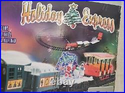 The HOLIDAY EXPRESS Animated Christmas Train Set New LOT of 4 The HOLIDAY EXPRESS Animated Christmas Train Set New LOT of 4
