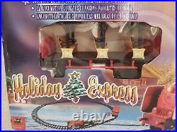 The HOLIDAY EXPRESS Animated Christmas Train Set New LOT of 4 The HOLIDAY EXPRESS Animated Christmas Train Set New LOT of 4
