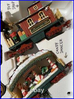 The HOLIDAY EXPRESS New Bright Animated Christmas Train Set #387 1996
