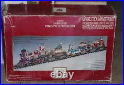 VINTAGE DILLARD'S TRIMMINGS CHRISTMAS ANIMATED ELECTRONIC TRAIN SET G SCALE Read