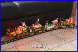 VINTAGE DILLARD'S TRIMMINGS CHRISTMAS ANIMATED ELECTRONIC TRAIN SET G SCALE Read